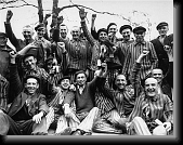 Polish prisoners found in Dachau toast their new found freedom from the camp * 473 x 370 * (52KB)